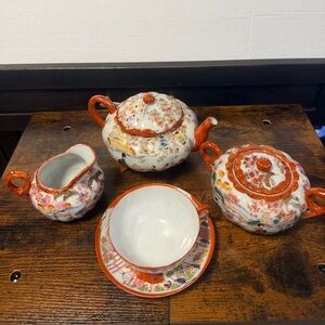 Japanese Kutani "Geisha Ware" porcelain tea set, intricate hand-painted.